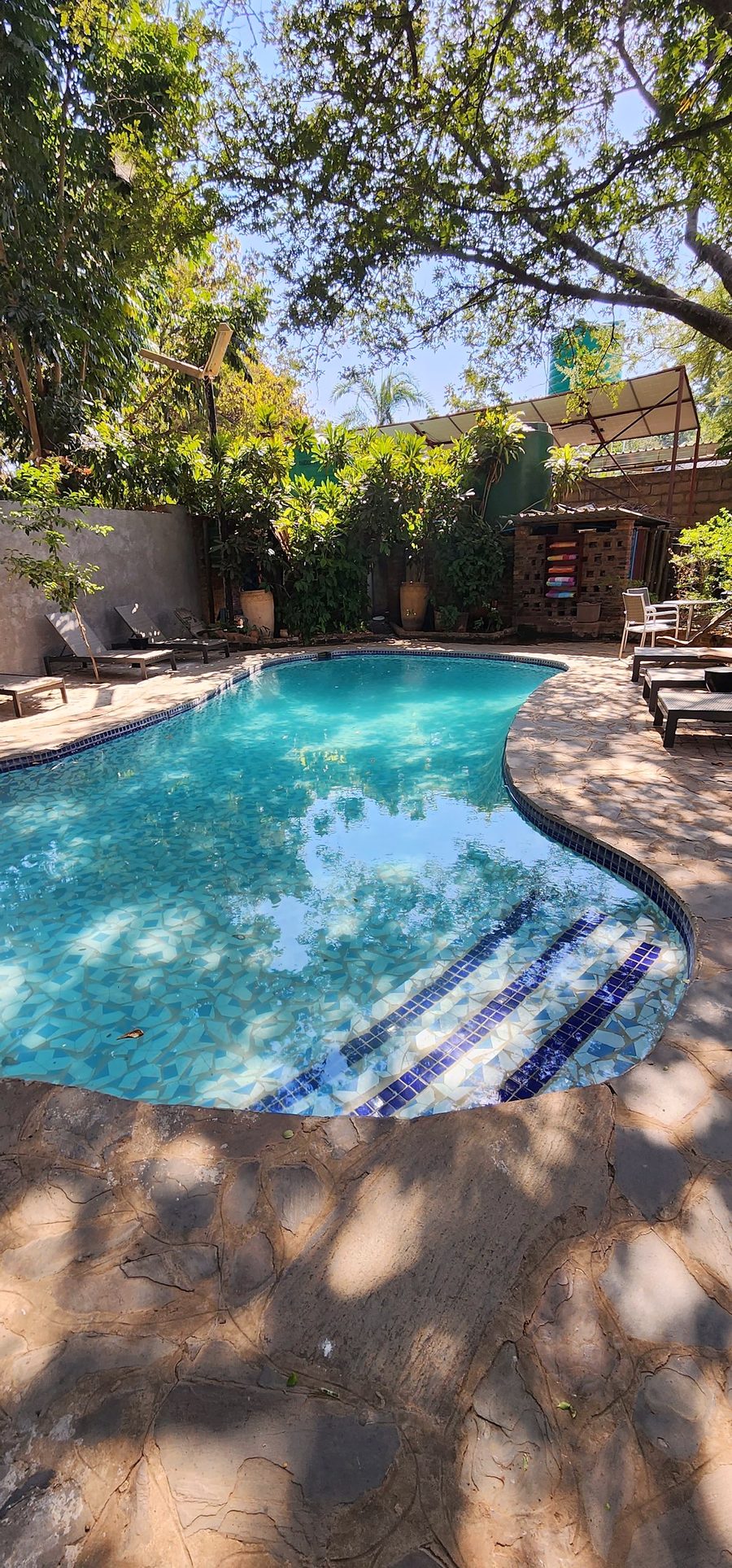 The mosaic-tiled pool