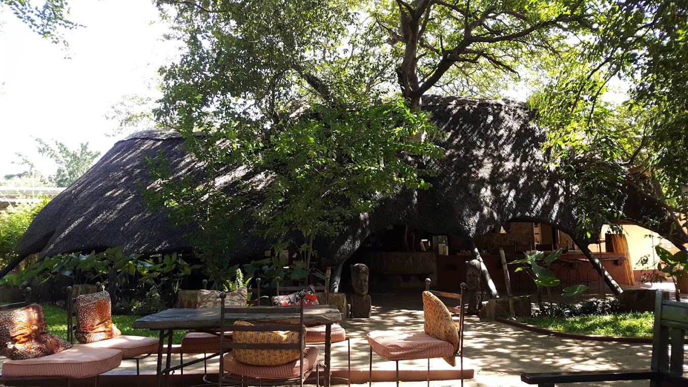 The thatched boma and outdoor tables